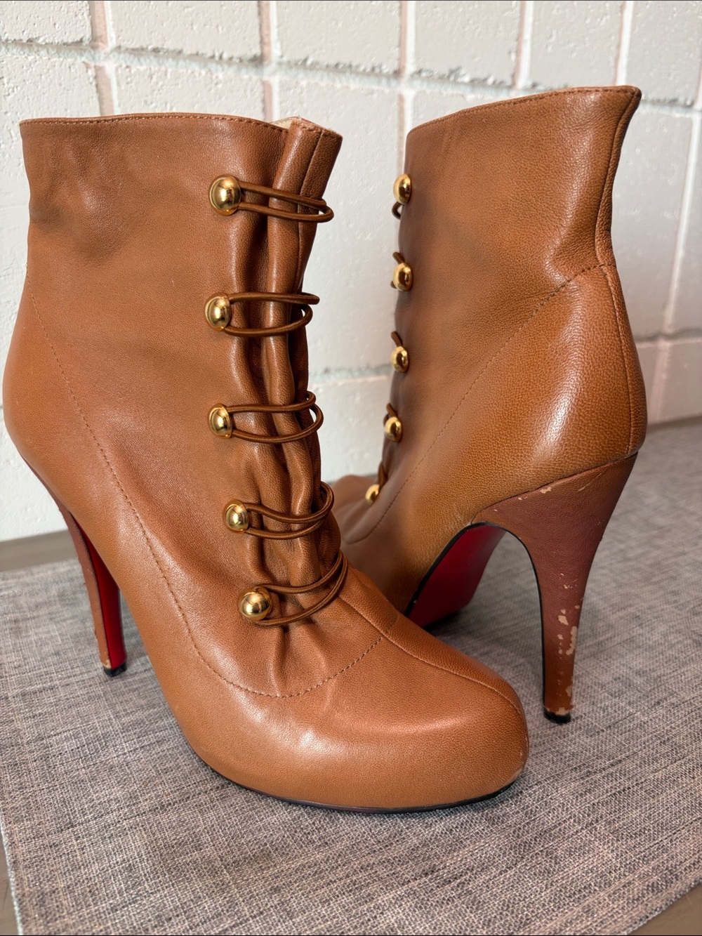 Christian Louboutin Tan Leather High-Heel Ankle Boots with Gold Buttons